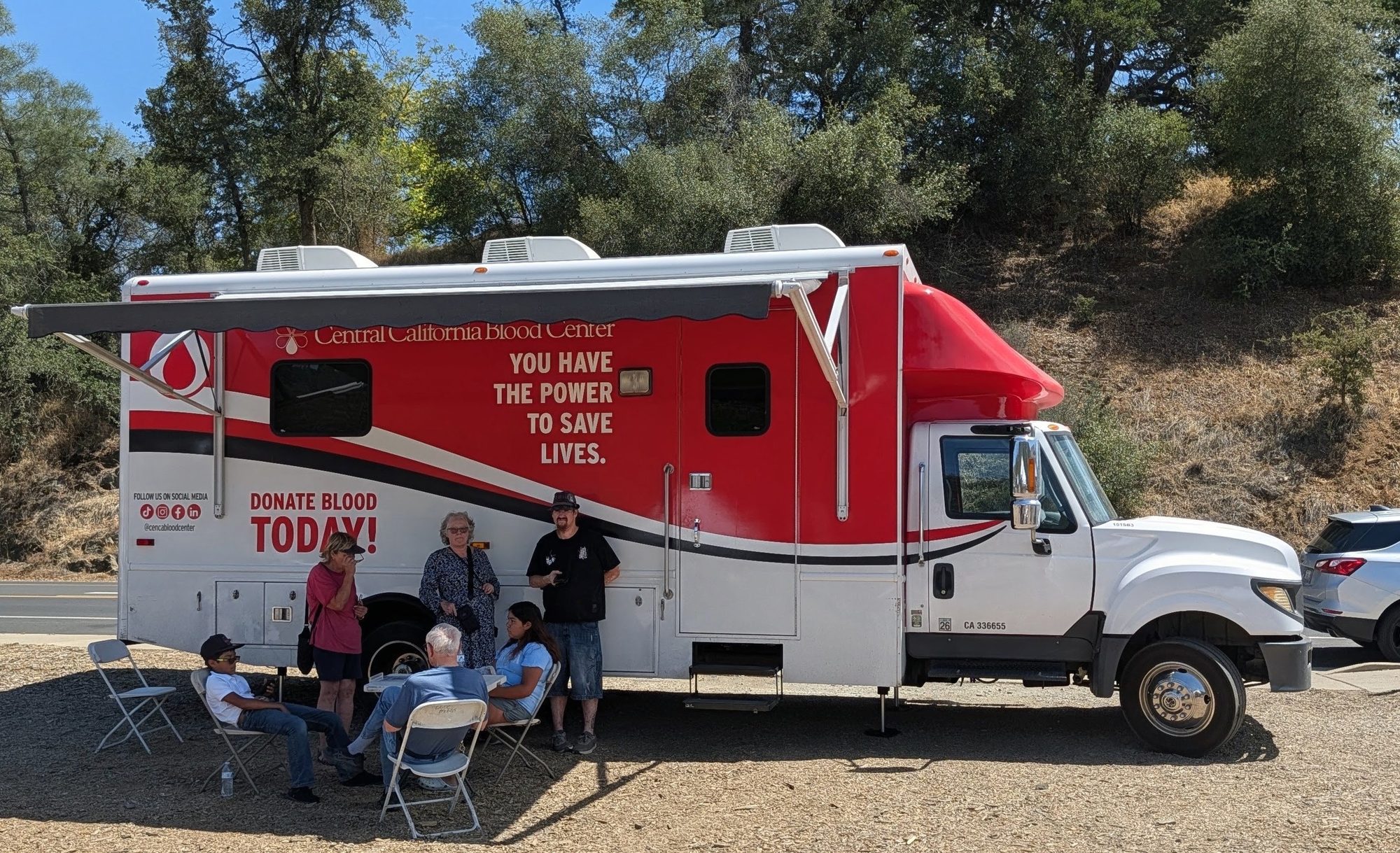 The Central California Blood Center bus on-site — donors gave blood all day.